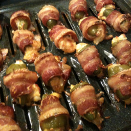 Jalapenos stuffed w/ crab and smoked cheddar, wrapped in bacon